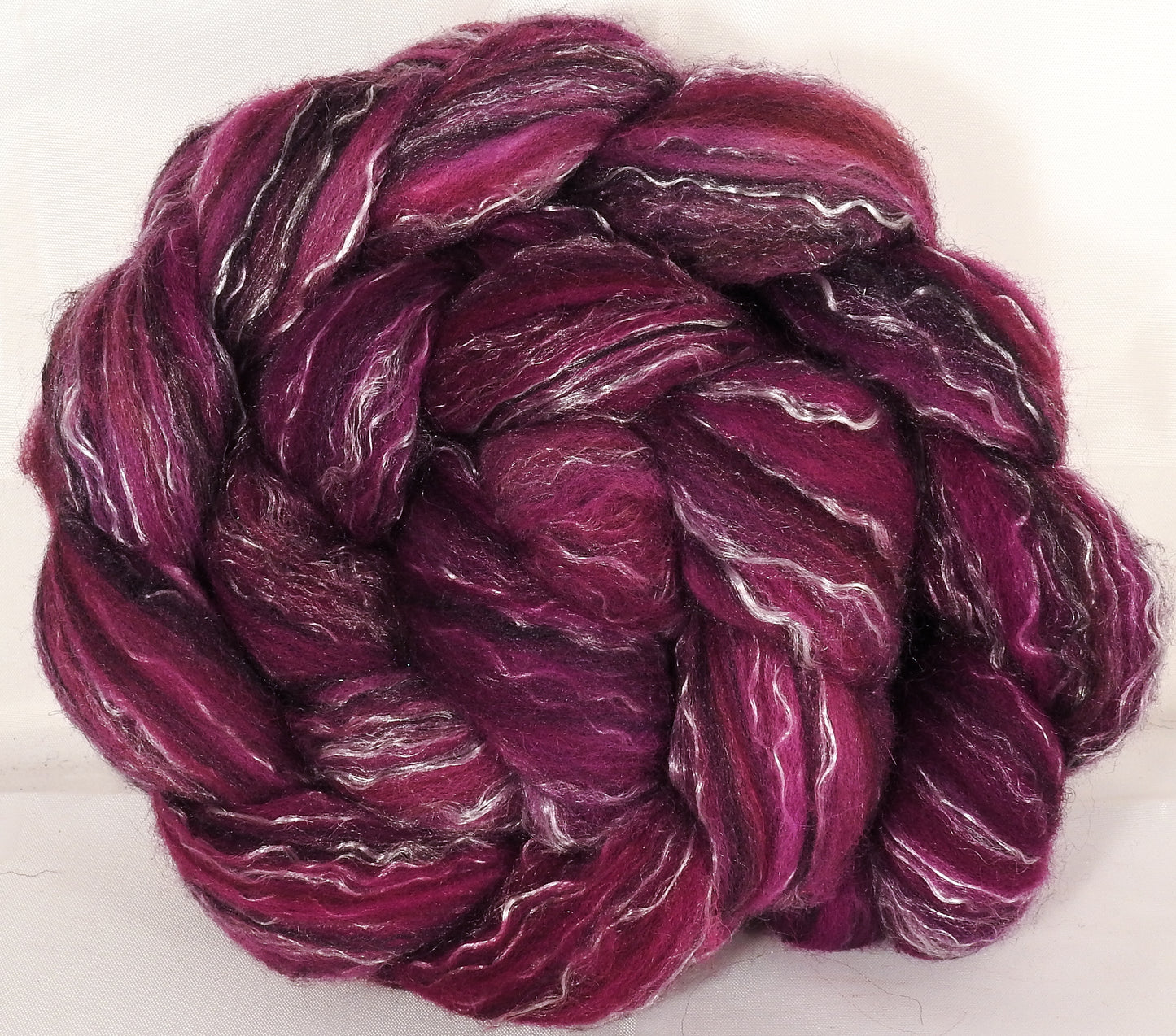 Batt in a Braid #2 - Redbud - (5.1 oz.)Polwarth/ Manx / Black tussah silk/ tencel (40/20/20/20) - Inglenook Fibers