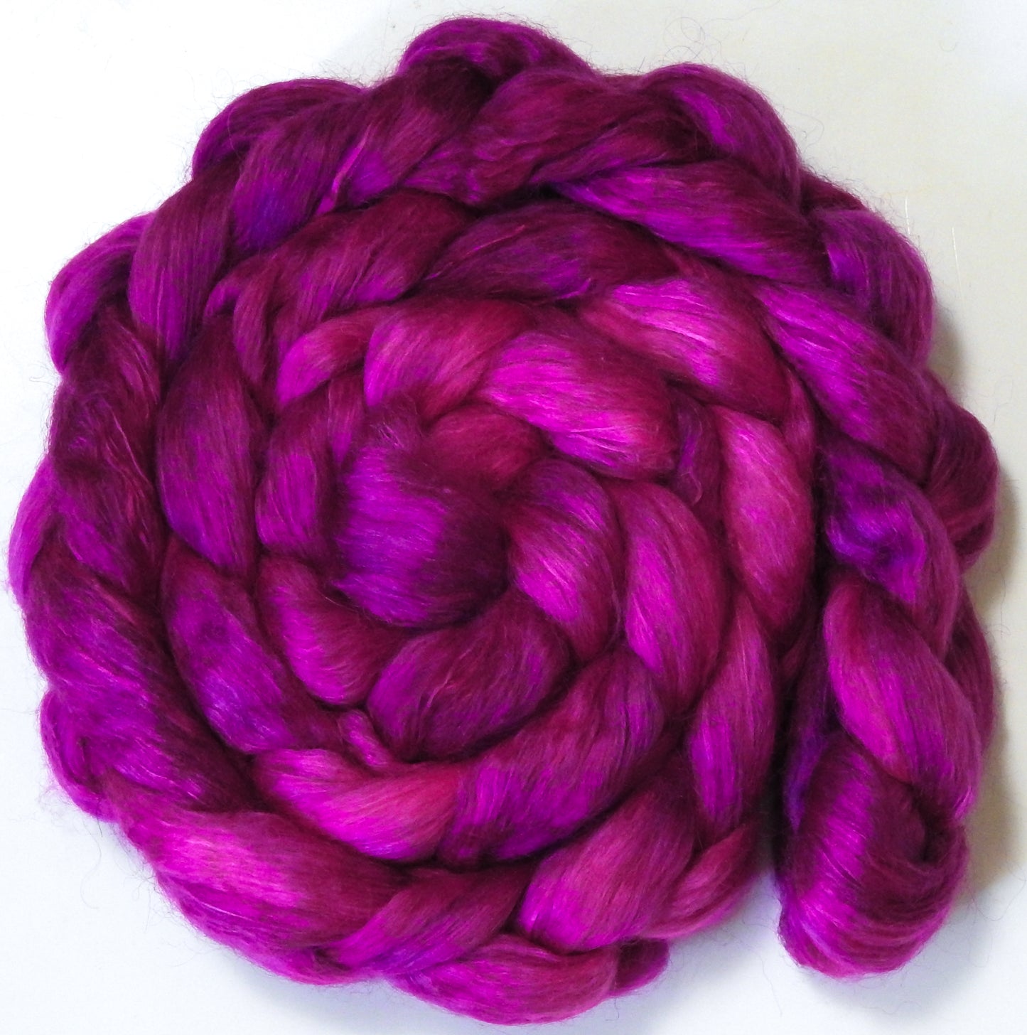 Dragonfruit (5.6 oz) - Batt in a Braid #52- Wensleydale/ Mulberry silk/ Polwarth (60/25/15)