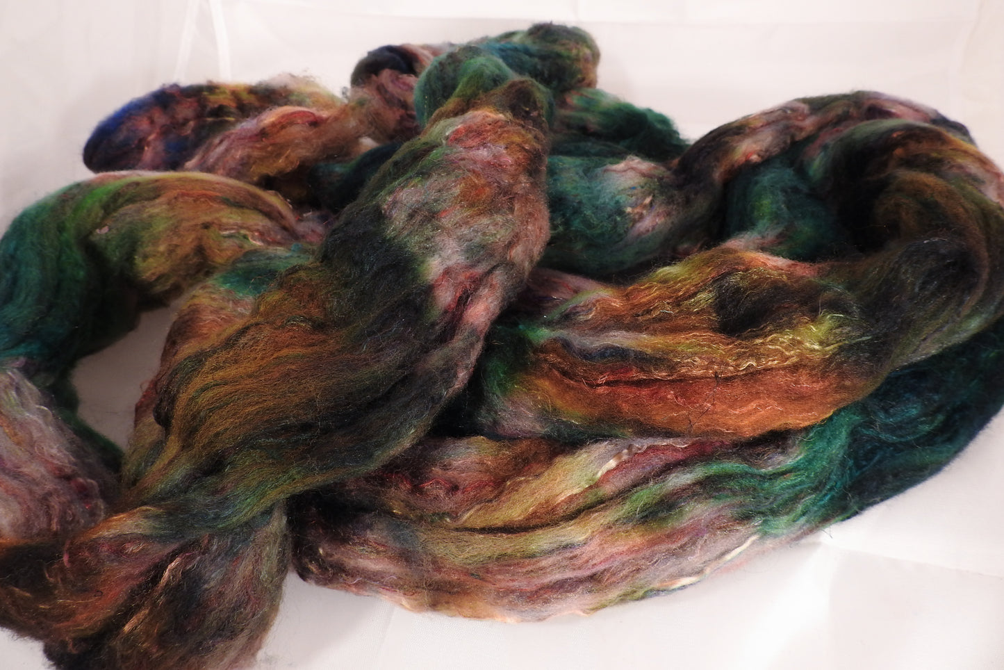 Batt in a Braid #39-SARI-21-(4.6 oz.)Falkland Merino/ Mulberry Silk / Sari Silk (50/25/25) - Inglenook Fibers