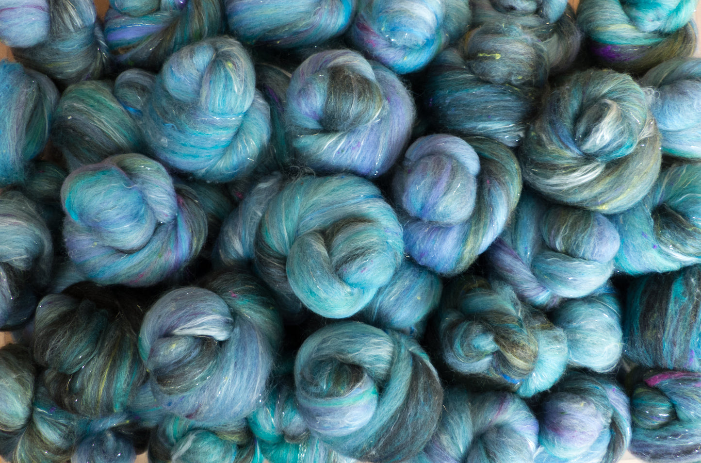 April Showers - Sparkle Sticklebatts (3.9 oz) - 30% Finn fleece; merino, polwarth, silk, bamboo, silk noil, silver deckle angelina