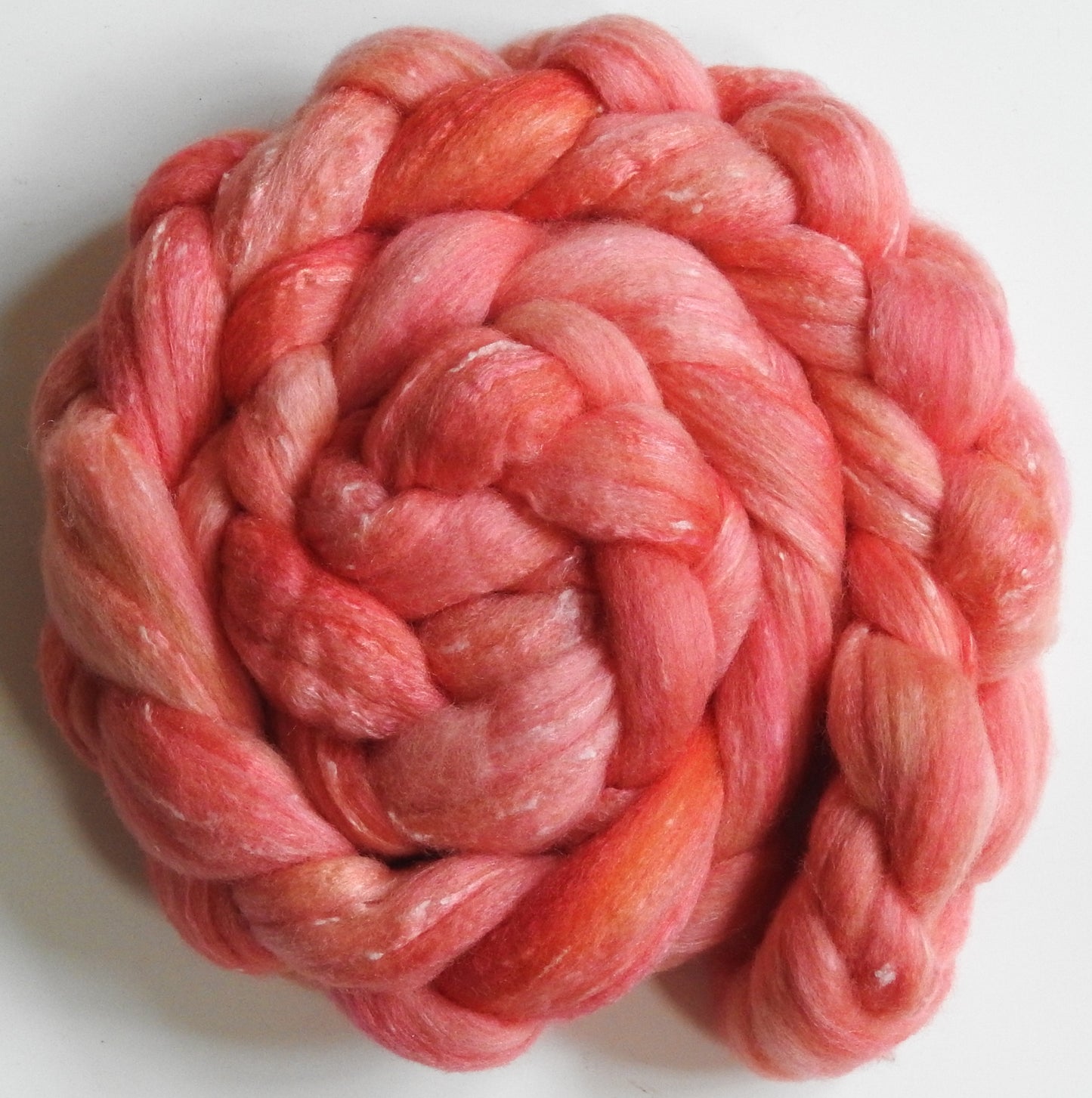 Sugar Coral-(5.6 oz) Batt in a Braid #49- Polwarth/Silk/ Tweed (50/25/25)