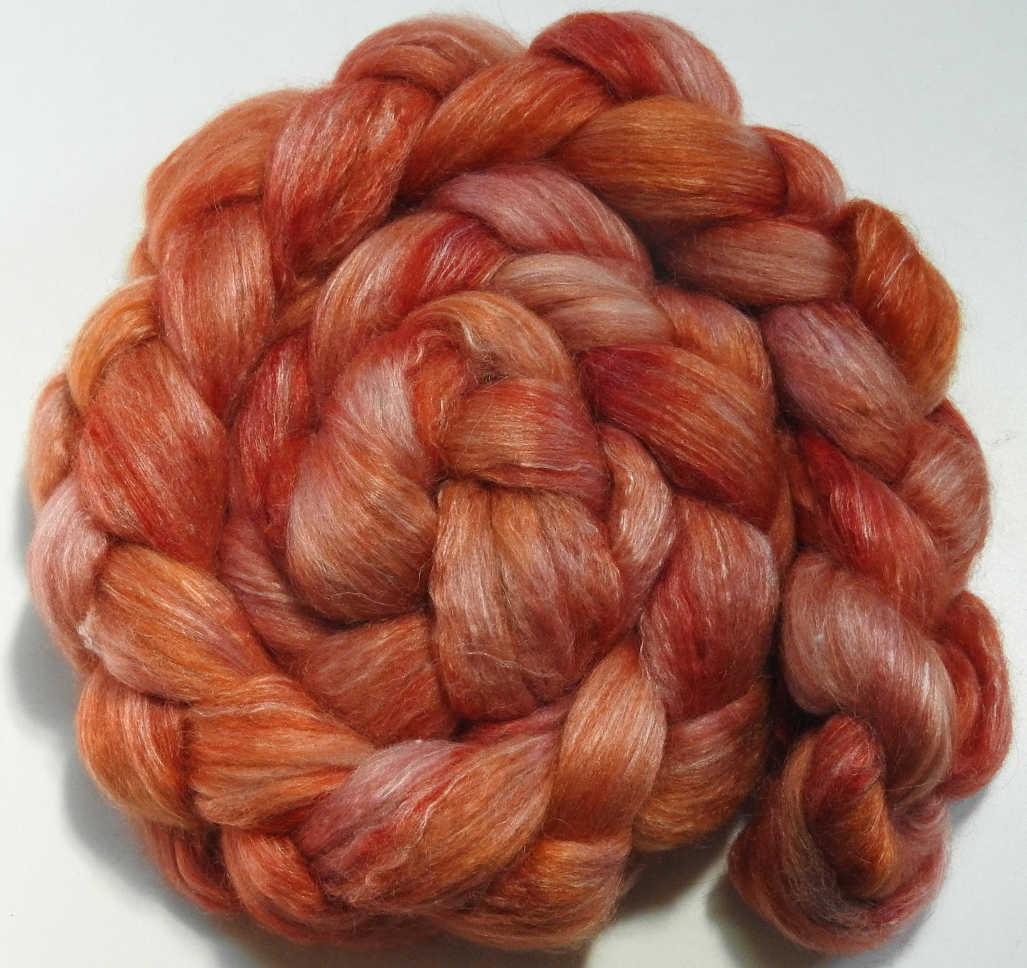 Coral Canna - Batt in a Braid #57- Camel/Baby Alpaca/Mint fiber  (50/25/25)