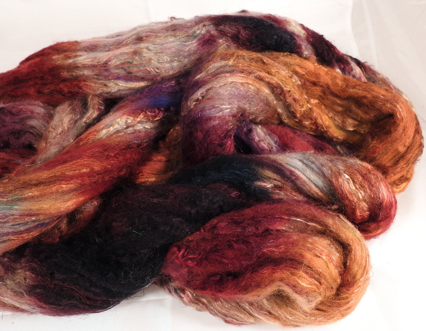Batt in a Braid #39-SARI-28-(4.6 oz.)Falkland Merino/ Mulberry Silk / Sari Silk (50/25/25) - Inglenook Fibers